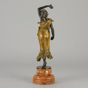 Flamenco Dancer by T Curts a charming Art Nouveau bronze figure of a flamboyant flamenco dancer holding a striking pose, her diaphonous gilded dress seductively draped over her, pinned and hinged to be removed in order to reveal her beautiful naked body