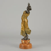 Flamenco Dancer by T Curts a charming Art Nouveau bronze figure of a flamboyant flamenco dancer holding a striking pose, her diaphonous gilded dress seductively draped over her, pinned and hinged to be removed in order to reveal her beautiful naked body