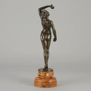Flamenco Dancer by T Curts a charming Art Nouveau bronze figure of a flamboyant flamenco dancer holding a striking pose, her diaphonous gilded dress seductively draped over her, pinned and hinged to be removed in order to reveal her beautiful naked body