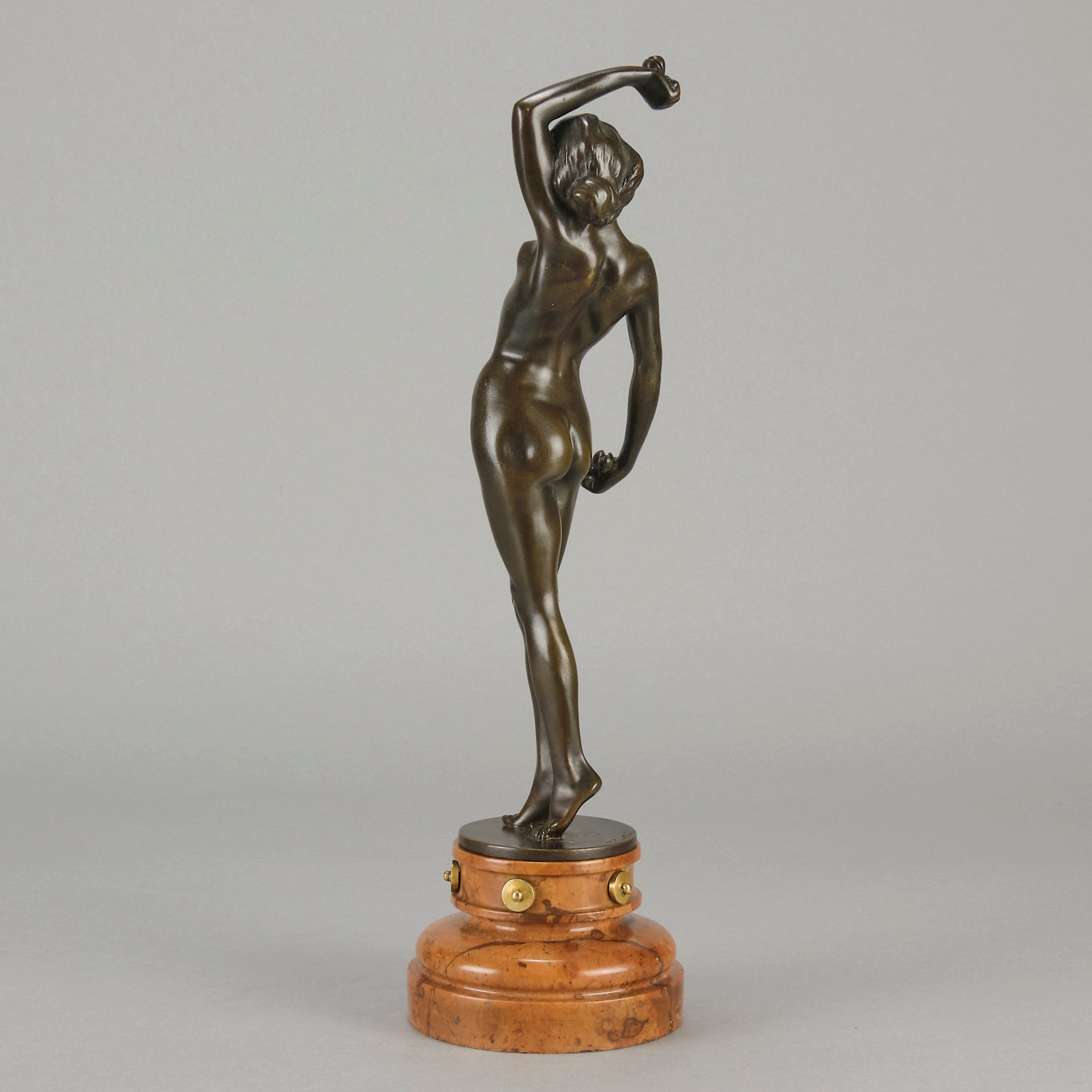 Flamenco Dancer by T Curts a charming Art Nouveau bronze figure of a flamboyant flamenco dancer holding a striking pose, her diaphonous gilded dress seductively draped over her, pinned and hinged to be removed in order to reveal her beautiful naked body