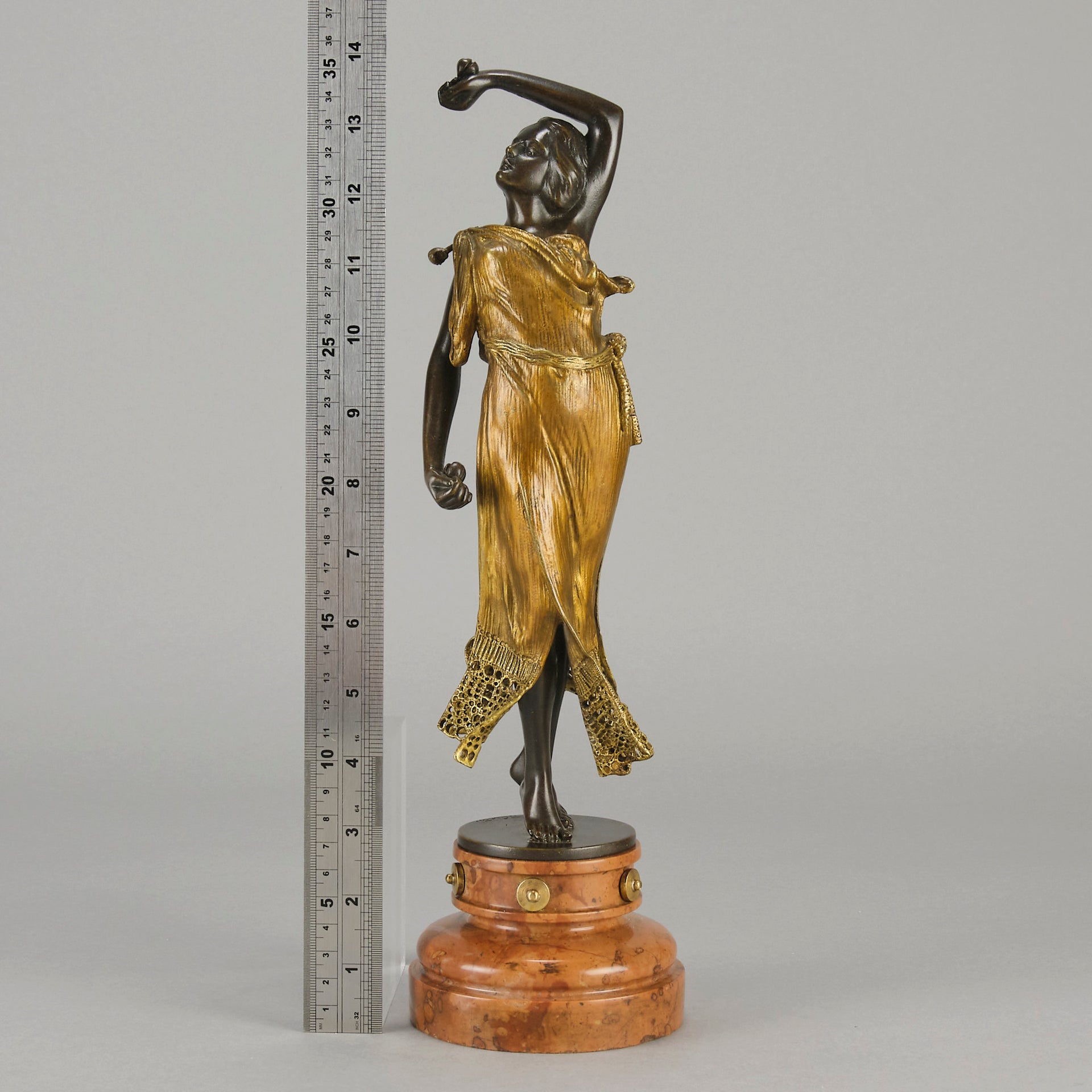 Flamenco Dancer by T Curts a charming Art Nouveau bronze figure of a flamboyant flamenco dancer holding a striking pose, her diaphonous gilded dress seductively draped over her, pinned and hinged to be removed in order to reveal her beautiful naked body