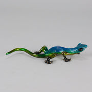 Margarita Gecko by Tim Cotterill a bronze study of a gecko with its head raised exhibiting very fine vibrant colours and excellent surface detail