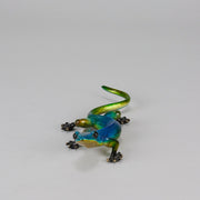 Margarita Gecko by Tim Cotterill a bronze study of a gecko with its head raised exhibiting very fine vibrant colours and excellent surface detail