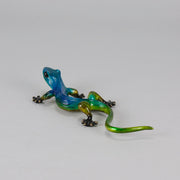 Margarita Gecko by Tim Cotterill a bronze study of a gecko with its head raised exhibiting very fine vibrant colours and excellent surface detail