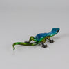 Margarita Gecko by Tim Cotterill a bronze study of a gecko with its head raised exhibiting very fine vibrant colours and excellent surface detail
