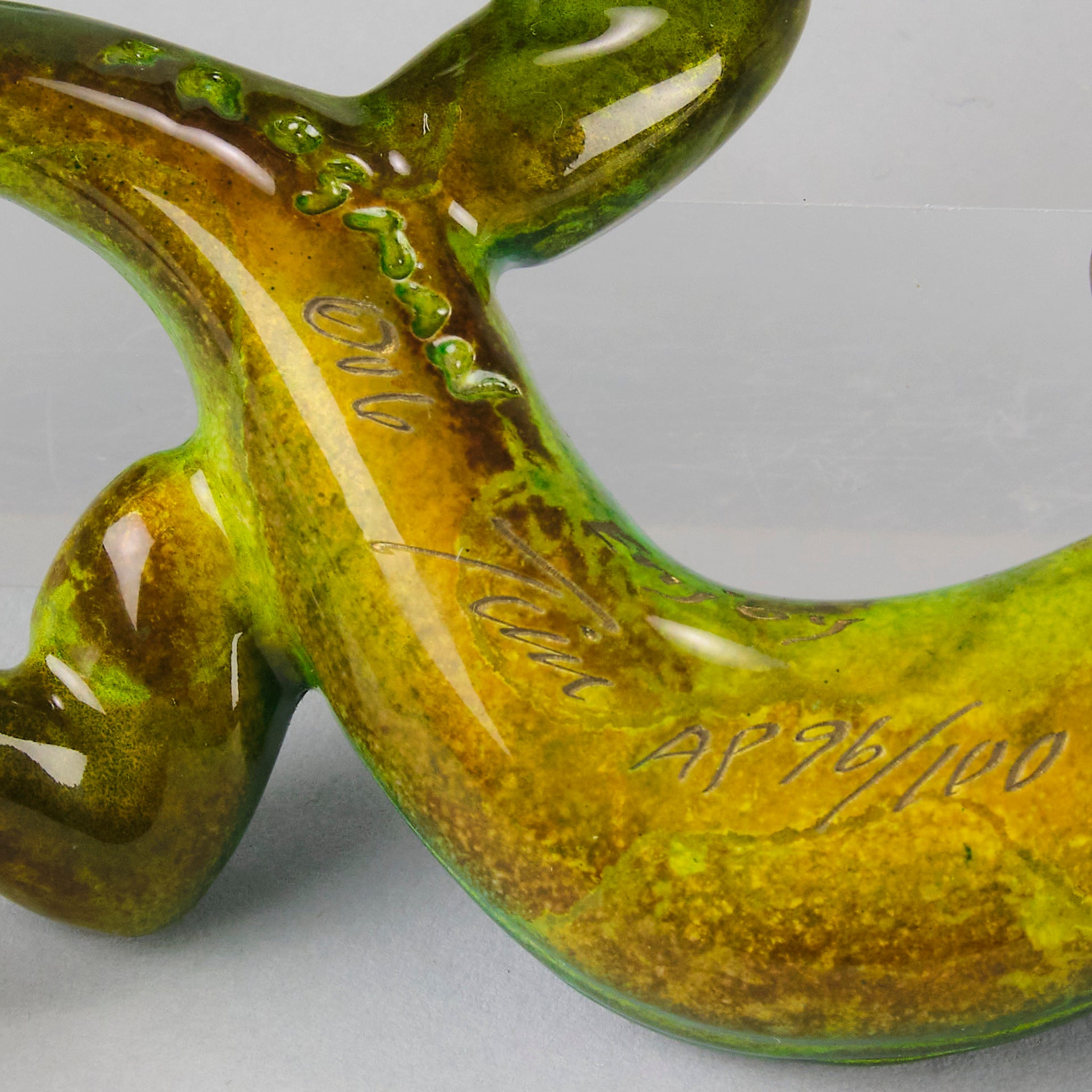 Margarita Gecko by Tim Cotterill a bronze study of a gecko with its head raised exhibiting very fine vibrant colours and excellent surface detail