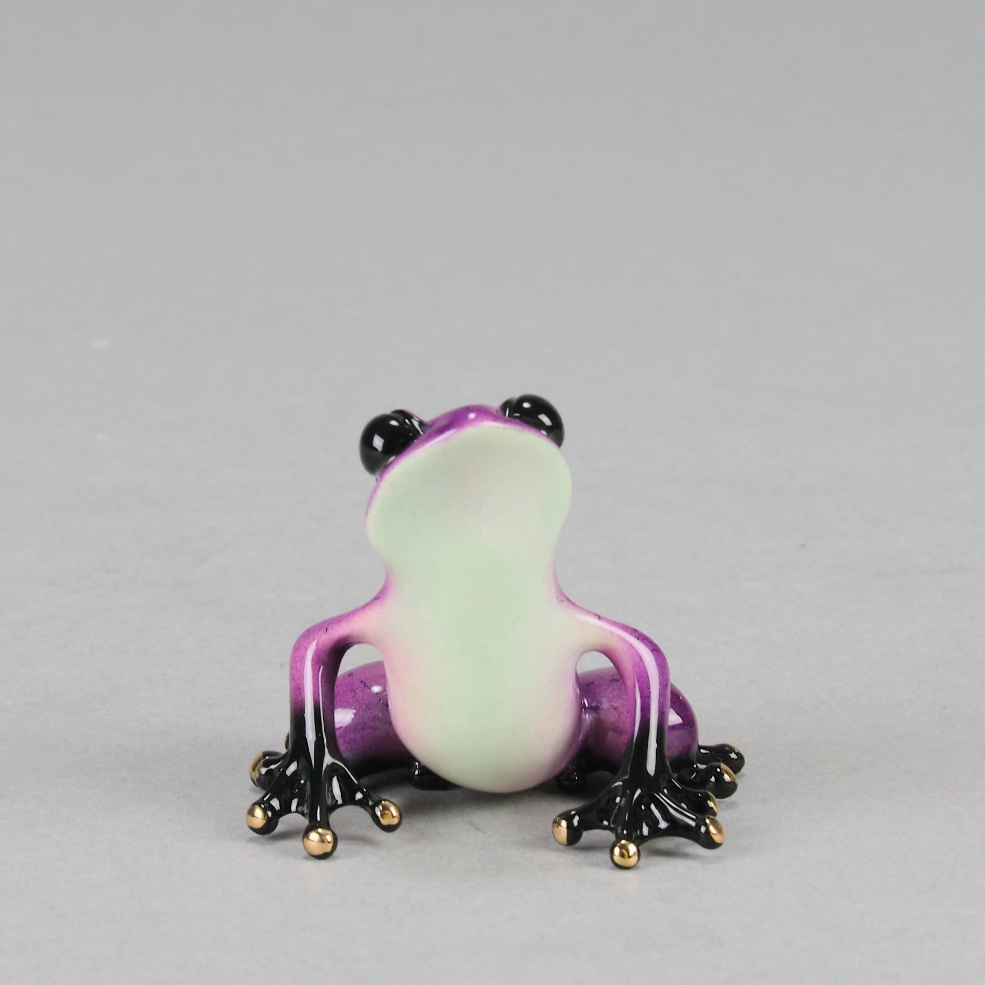 Berry An attractive limited edition bronze study of a purple frog in a seated position exhibiting very fine bright enamel colours by Tim Cotterill - Hickmet Fine Arts