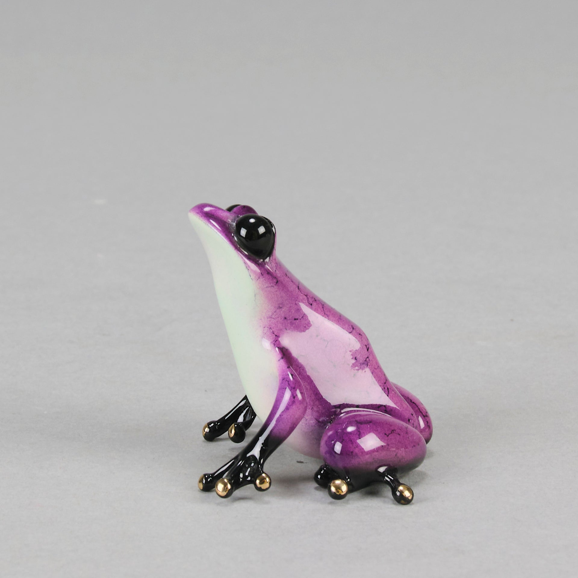 Berry An attractive limited edition bronze study of a purple frog in a seated position exhibiting very fine bright enamel colours by Tim Cotterill - Hickmet Fine Arts
