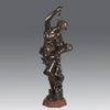 Antique bronze figures Venus & Cupid by J Sul-Abadie a study of Venus taking an arrow from Cupid her son, who at times would shoot his arrows without meaning or reason into the hearts of men, igniting their desire