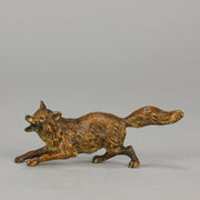 Vienna Bronze Fox A very fine early 20th Century cold-painted Austrian bronze figure of an energetic fox in a running pose