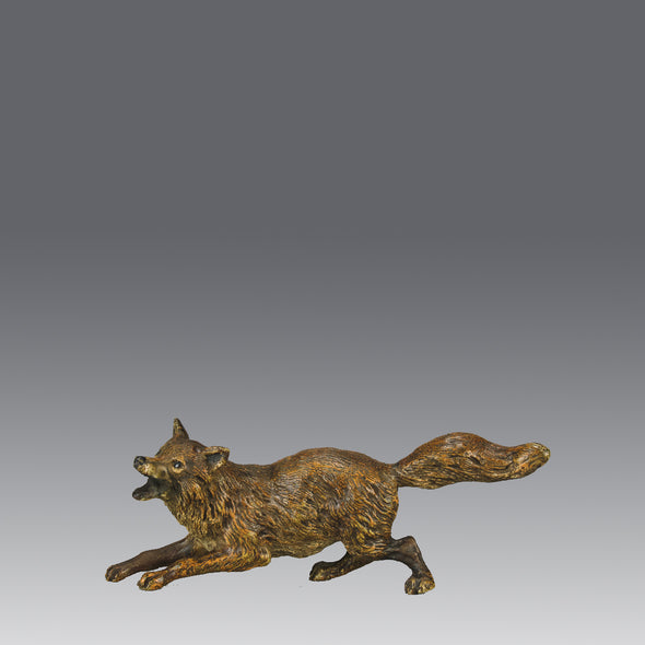 Vienna Bronze Fox A very fine early 20th Century cold-painted Austrian bronze figure of an energetic fox in a running pose