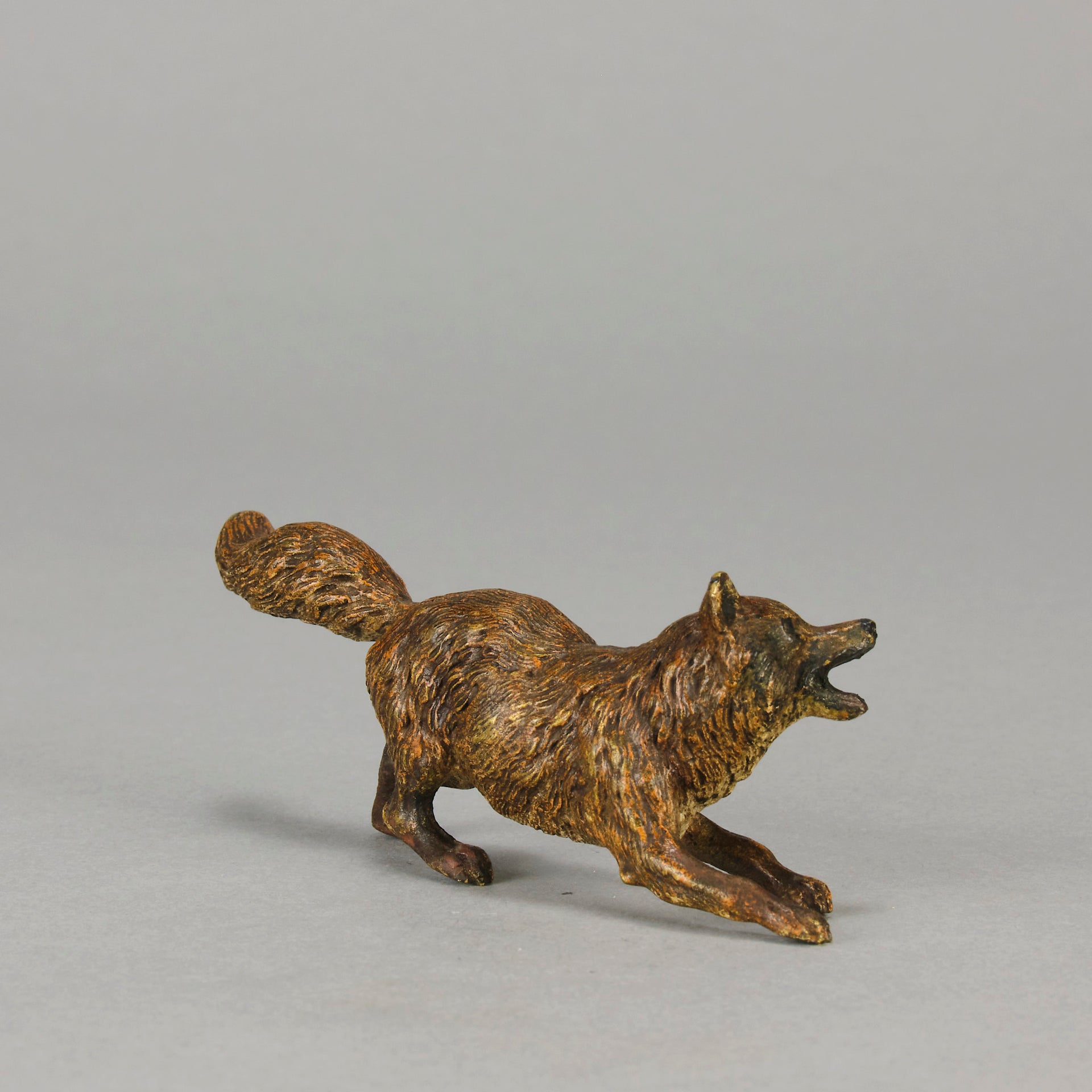 Vienna Bronze Fox A very fine early 20th Century cold-painted Austrian bronze figure of an energetic fox in a running pose