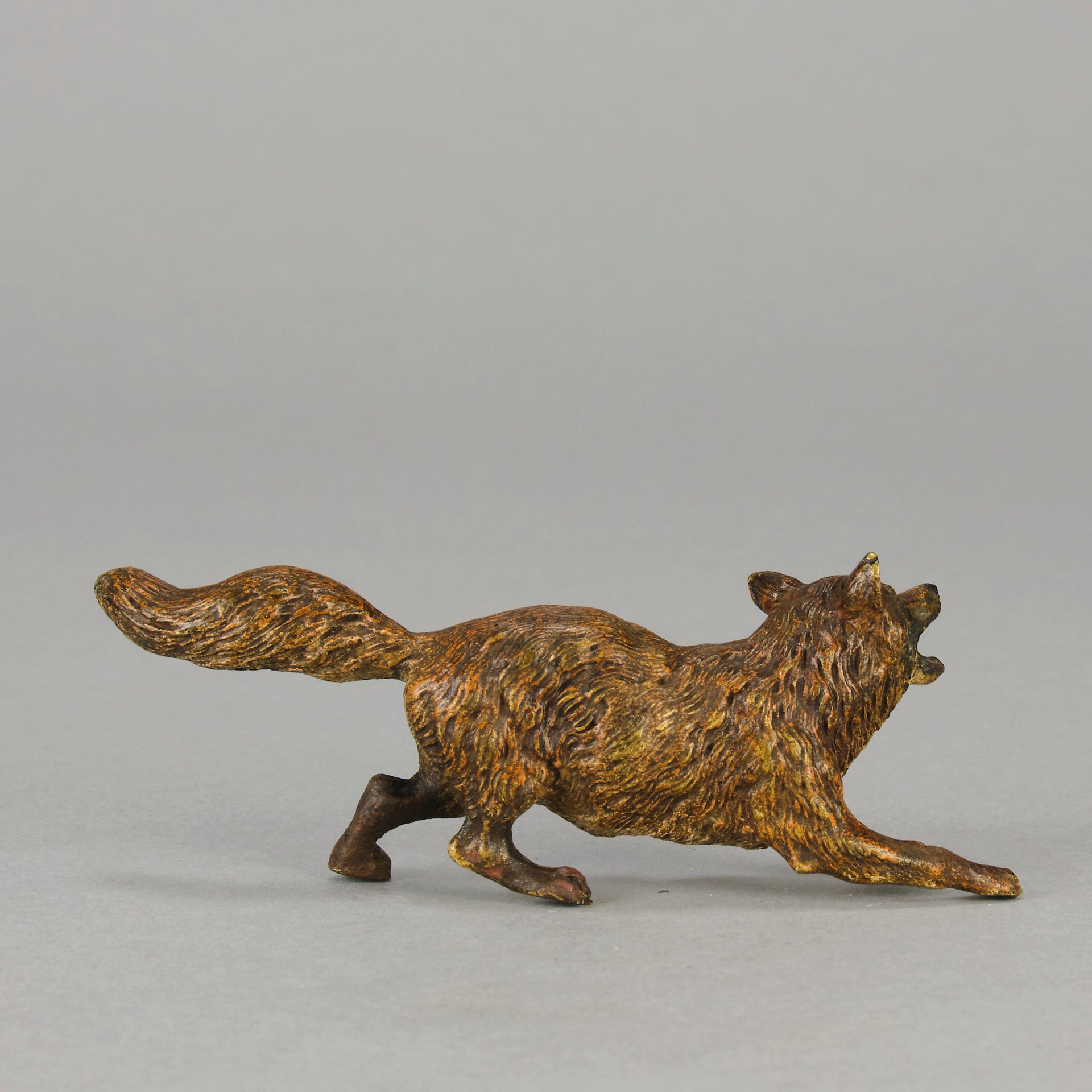 Vienna Bronze Fox A very fine early 20th Century cold-painted Austrian bronze figure of an energetic fox in a running pose