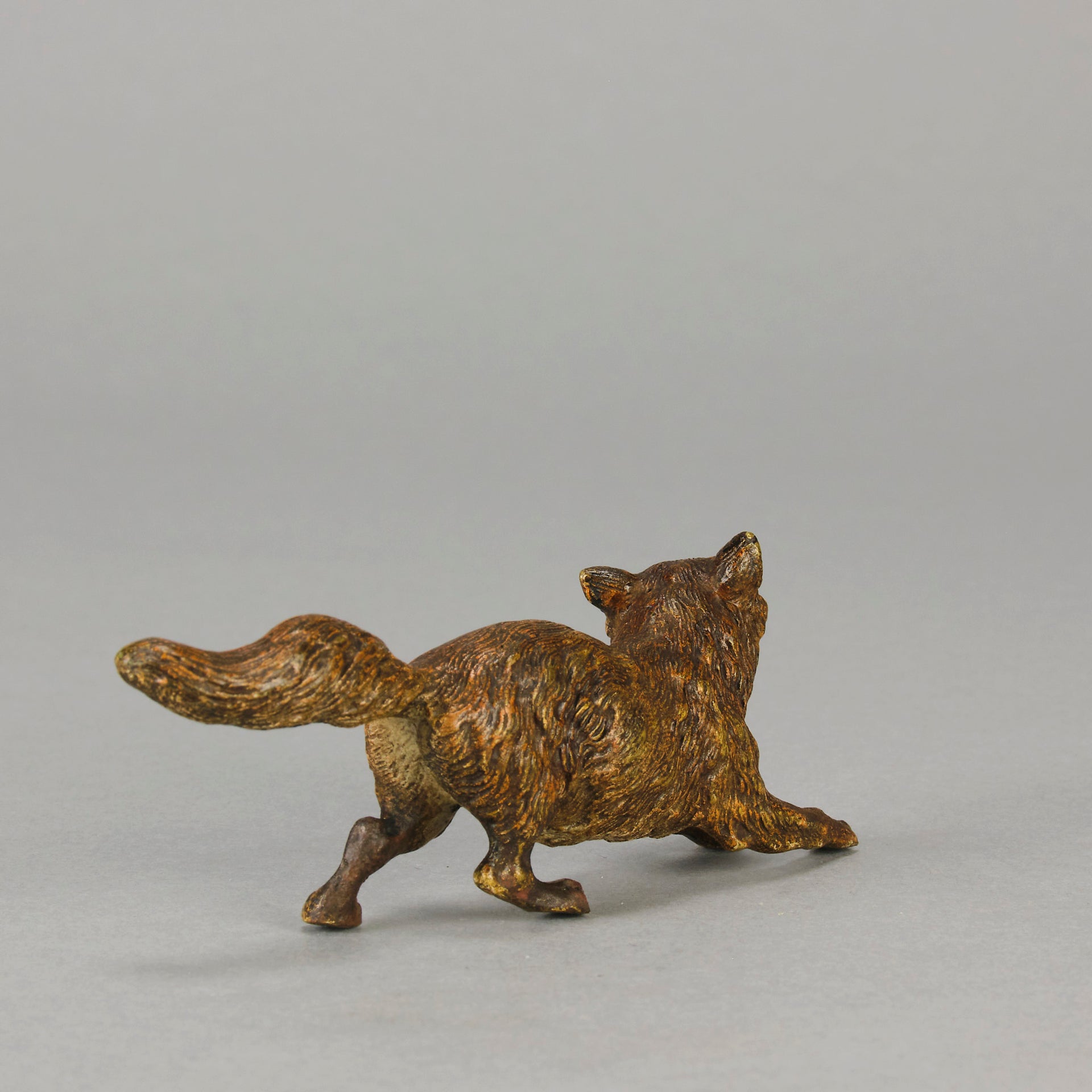 Vienna Bronze Fox A very fine early 20th Century cold-painted Austrian bronze figure of an energetic fox in a running pose