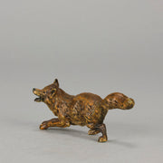 Vienna Bronze Fox A very fine early 20th Century cold-painted Austrian bronze figure of an energetic fox in a running pose