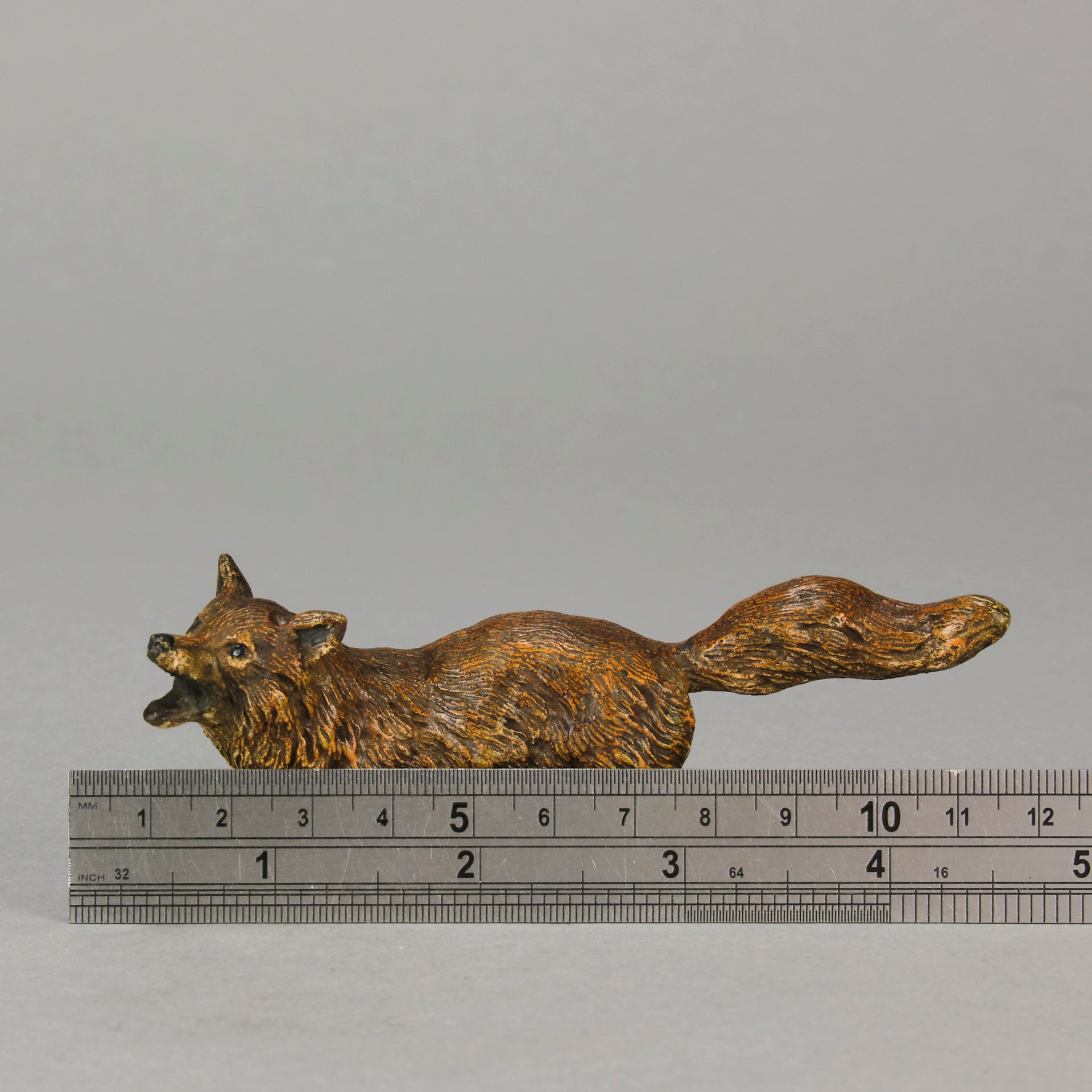 Vienna Bronze Fox A very fine early 20th Century cold-painted Austrian bronze figure of an energetic fox in a running pose
