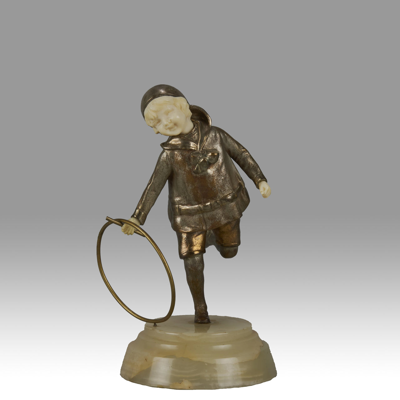 "Boy with Hoop" by Demetre Chiparus