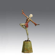 Helga by Josef Lorenzl An Art Deco Bronze and ivory igure of a beautiful dancer holding an elegant pose exhibiting excellent colour and very fine hand chased surface detail, raised on a green onyx base 