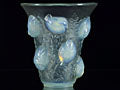 Saint Francois by Rene Lalique an impressive frosted glass vase with flared rim on tapering cylindrical body of opalescent glass, relief-decorated with birds, leaves, and vines with excellent colour
